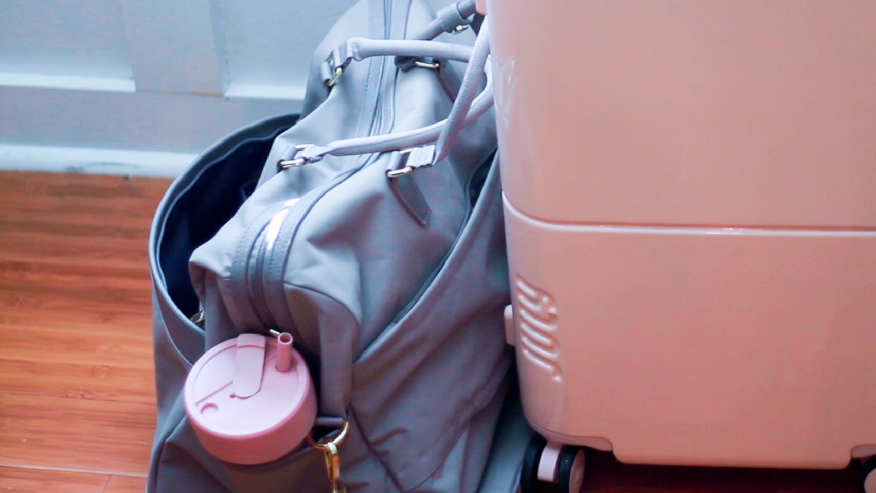 carry-on suitcase and personal bag for traveling