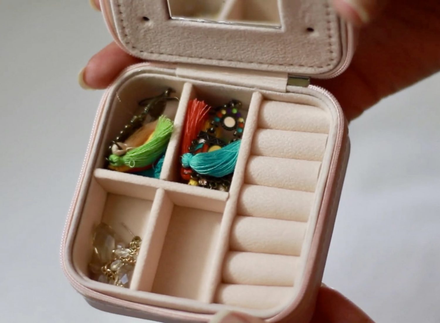 small light pink travel jewelry case